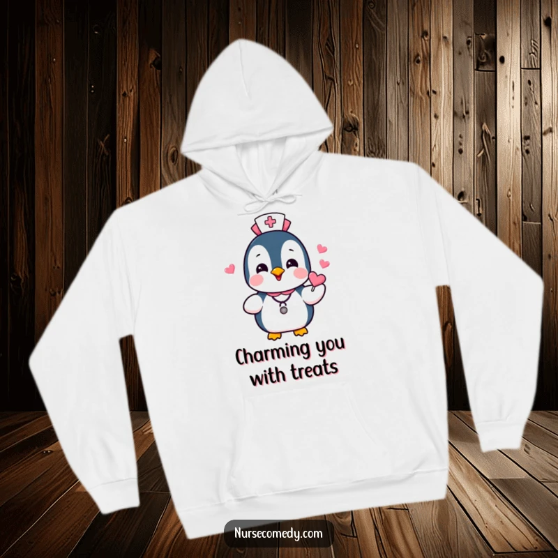 Funny Penguin Nurse Hoodie showcasing a happy penguin character offering heart-shaped candies, representing warmth, care, and a touch of humor.