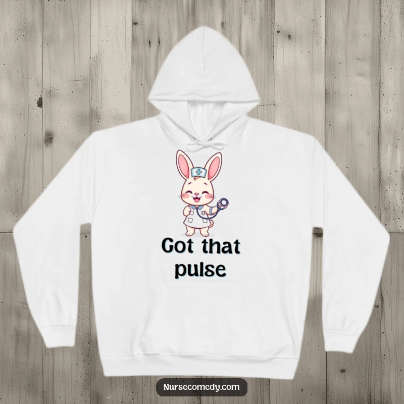 Funny Kawaii Bunny Nurse Hoodie: A cheerful bunny nurse bounces a stethoscope, offering cozy comfort with a side of medical humor.